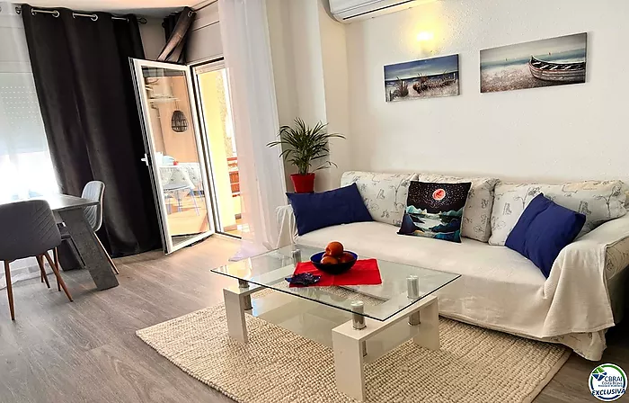 Renovated apartment with large terrace and side view of the canal