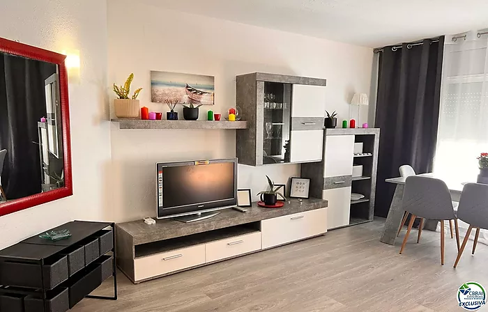 Renovated apartment with large terrace and side view of the canal