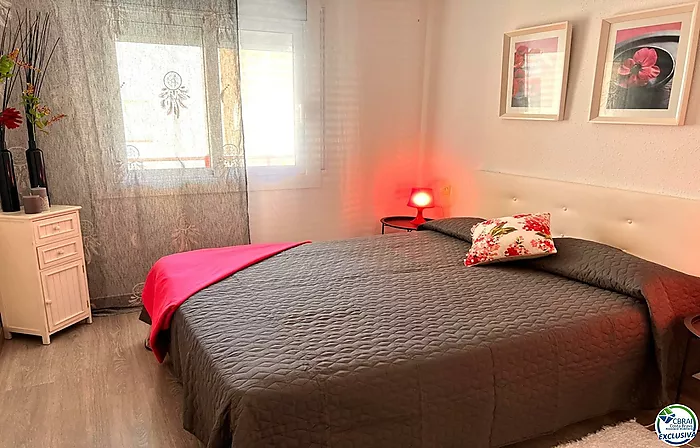 Renovated apartment with large terrace and side view of the canal