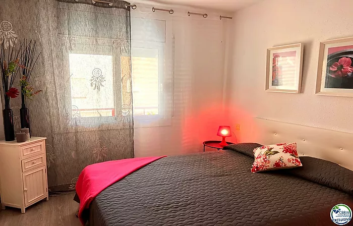 Renovated apartment with large terrace and side view of the canal